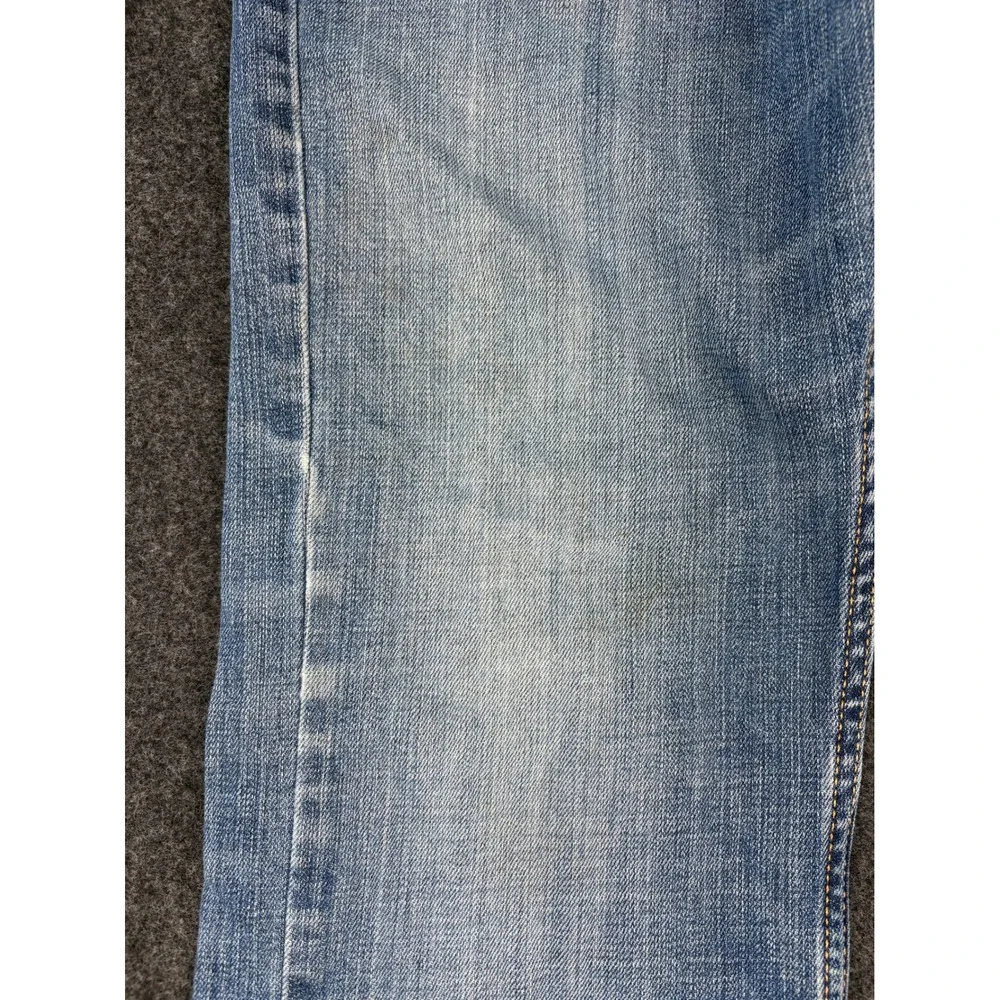 Levis 527 Slim Bootcut Jeans Mens 33x30 Light Wash Blue Denim 05527-0489